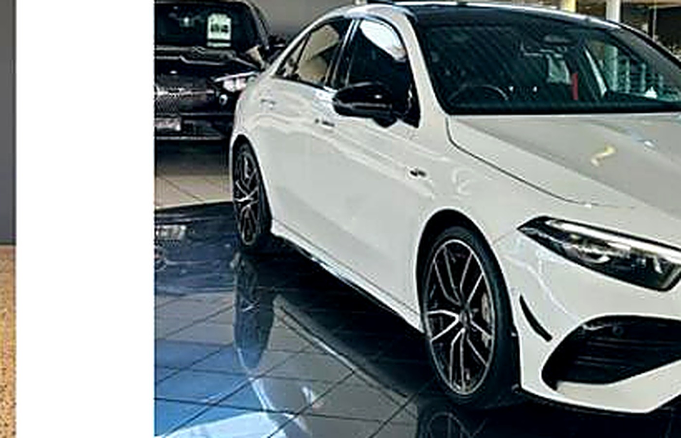 White luxury executive sedan, front view