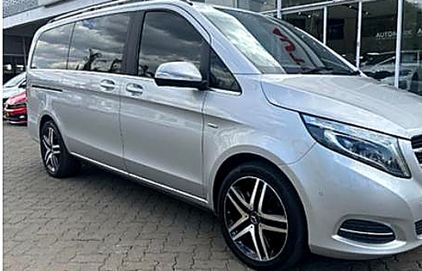 Silver luxury executive van, front view