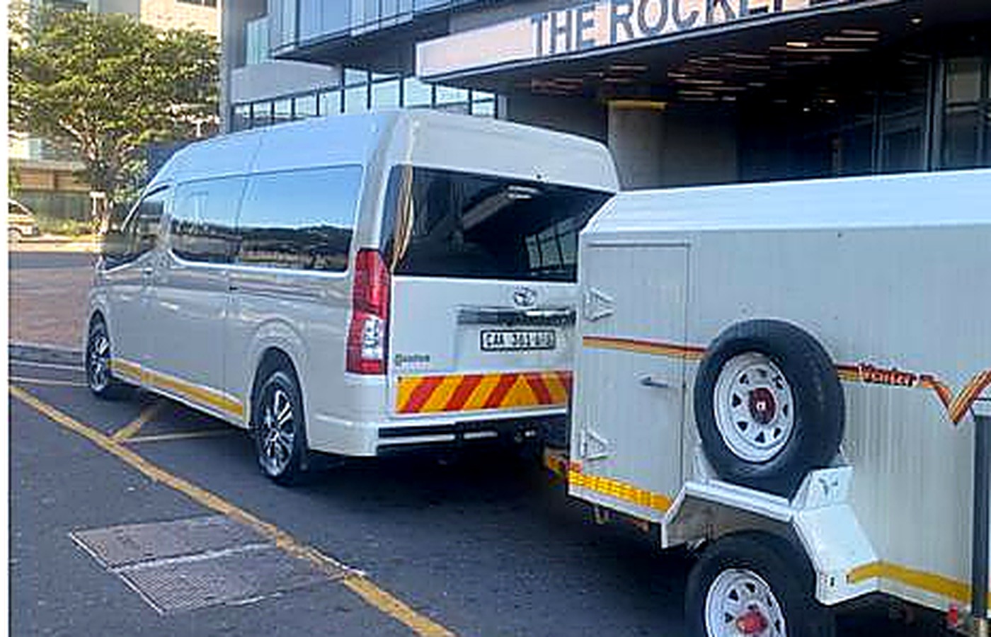 Minibus with luggage trailer