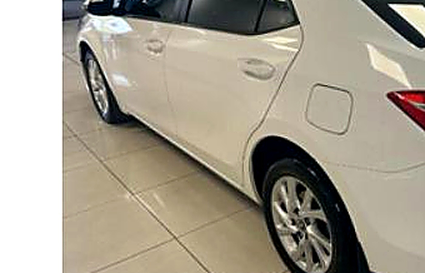 Economy sedan, rear view